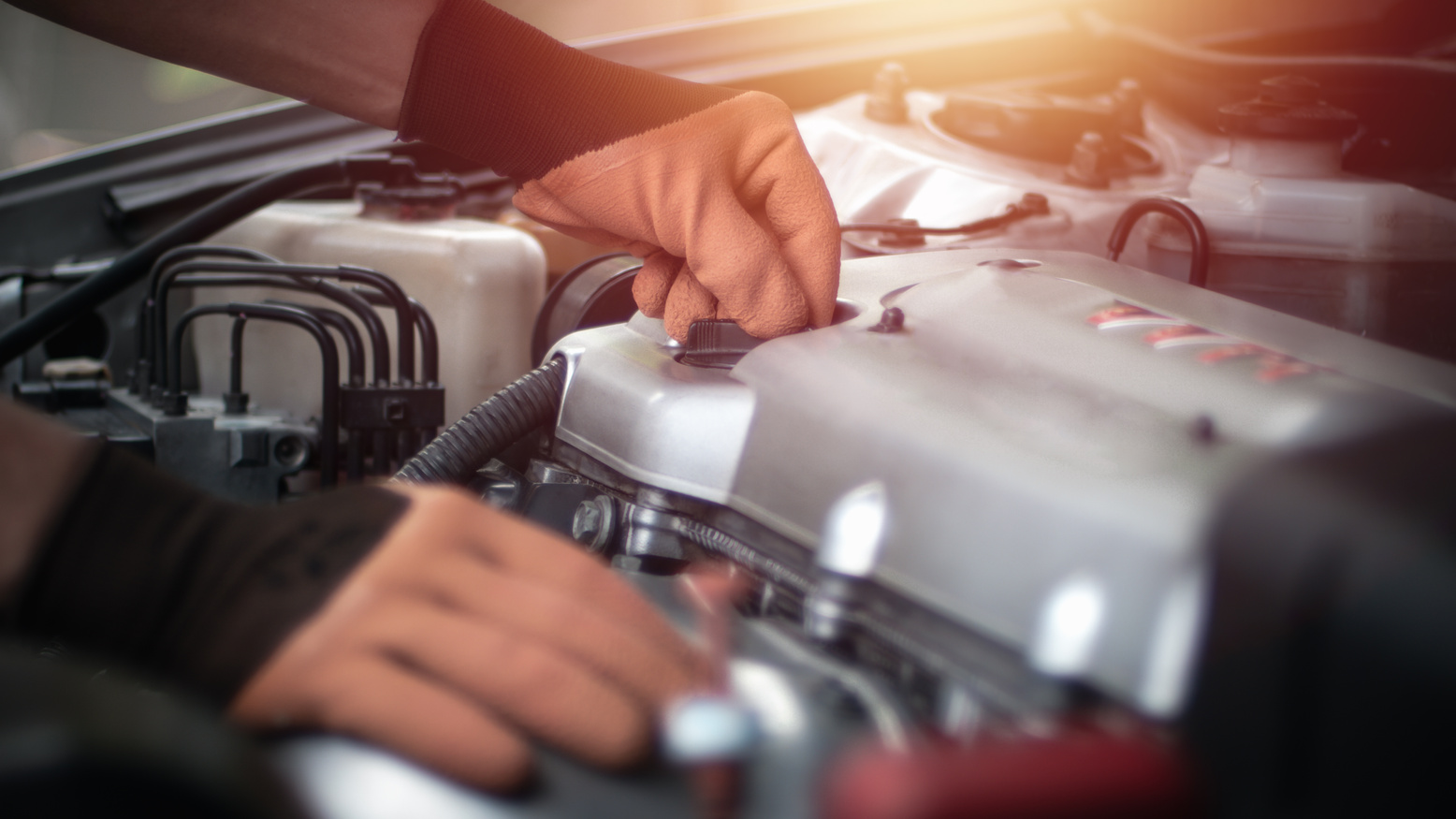 Auto Mechanic Working in Garage